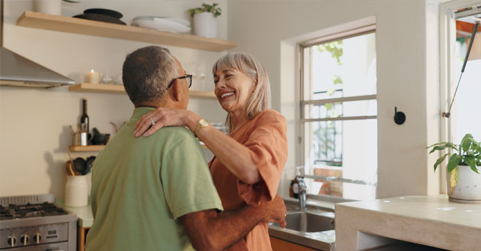 Image showing senior couple love and dancing in the kitchen